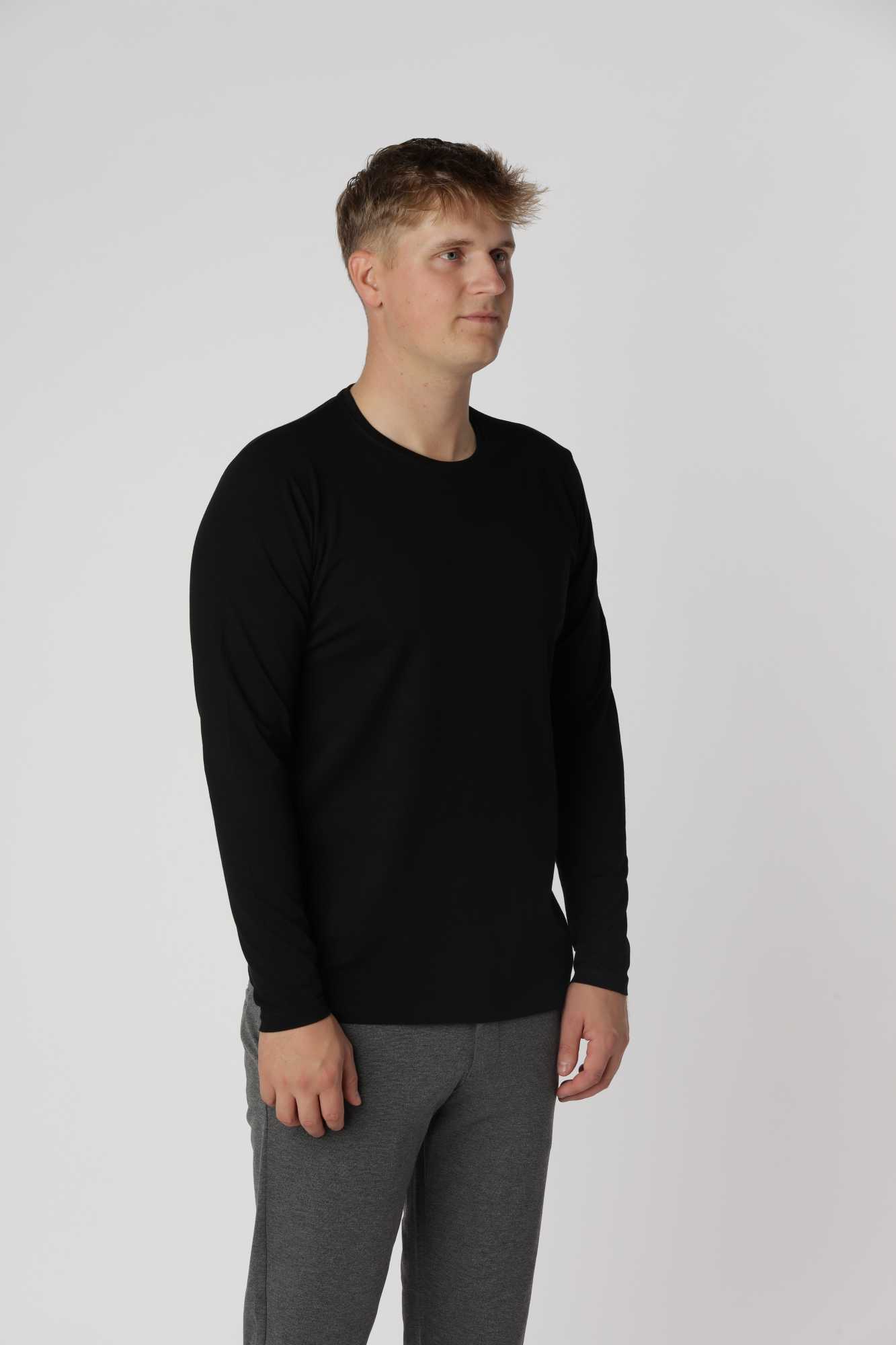 Shape langærmet t-shirt i sort med minimalistisk design og skarp silhuet